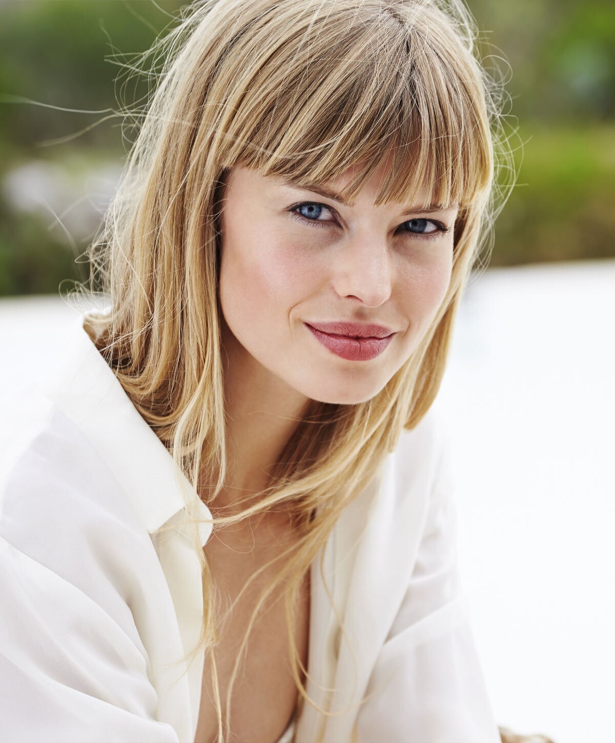 RHA fillers patient model in a white button up shirt